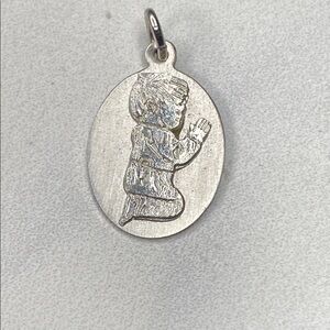 Silver Oval Pendant with Praying Child‎ Design